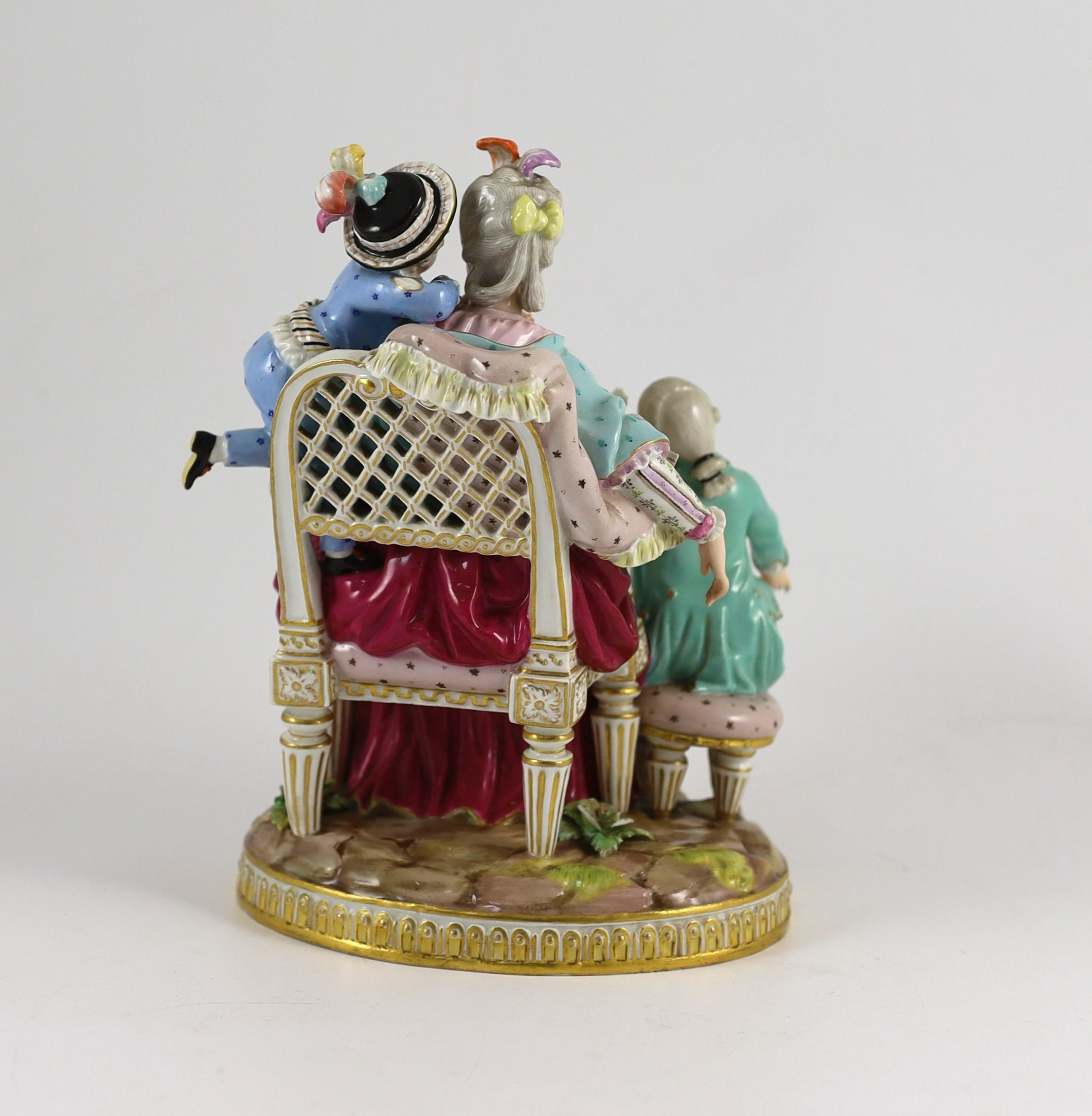 A Meissen group of the good mother, 19th century, after a model by Michel Victor Acier, 22 cm high